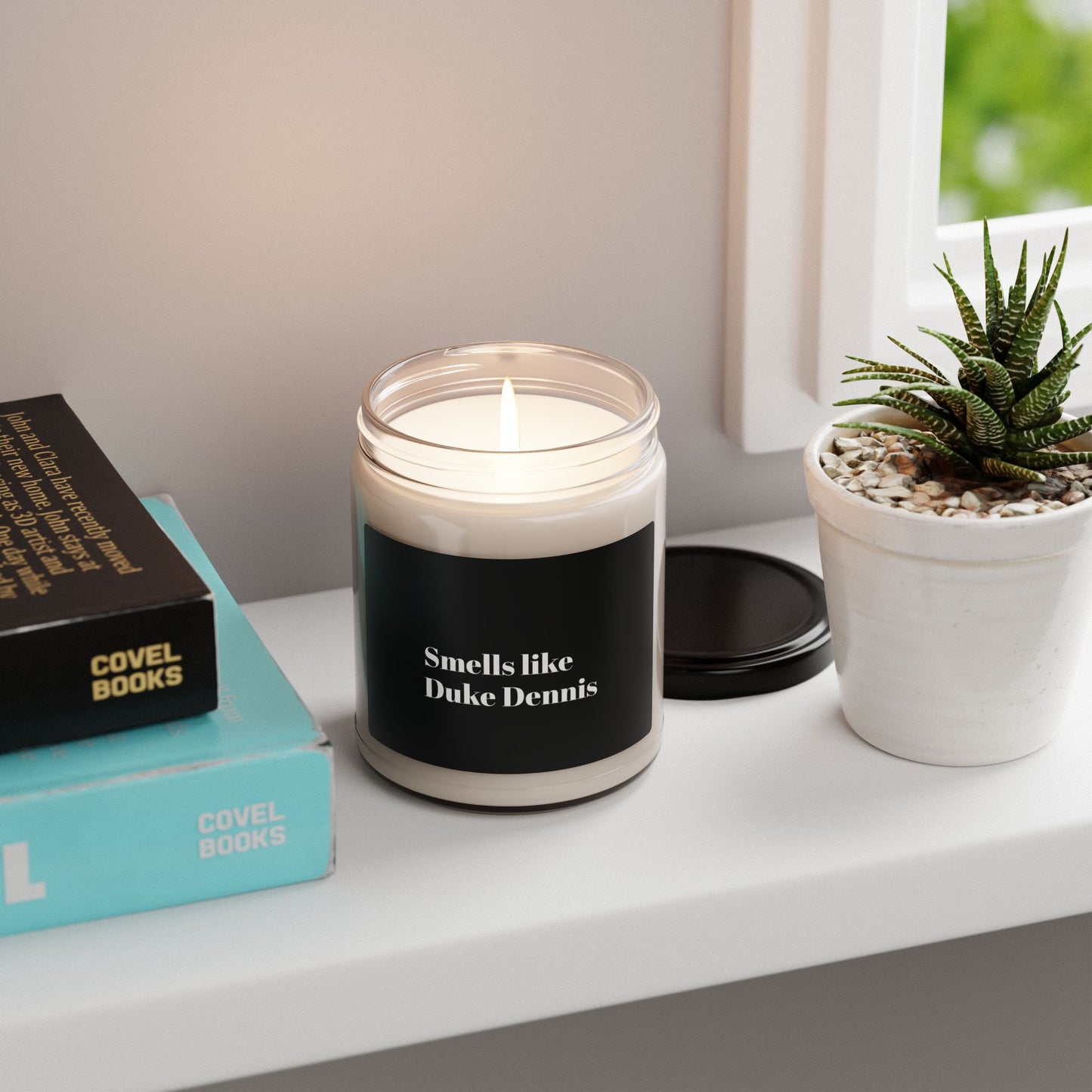 Smells like Duke Dennis Candle
